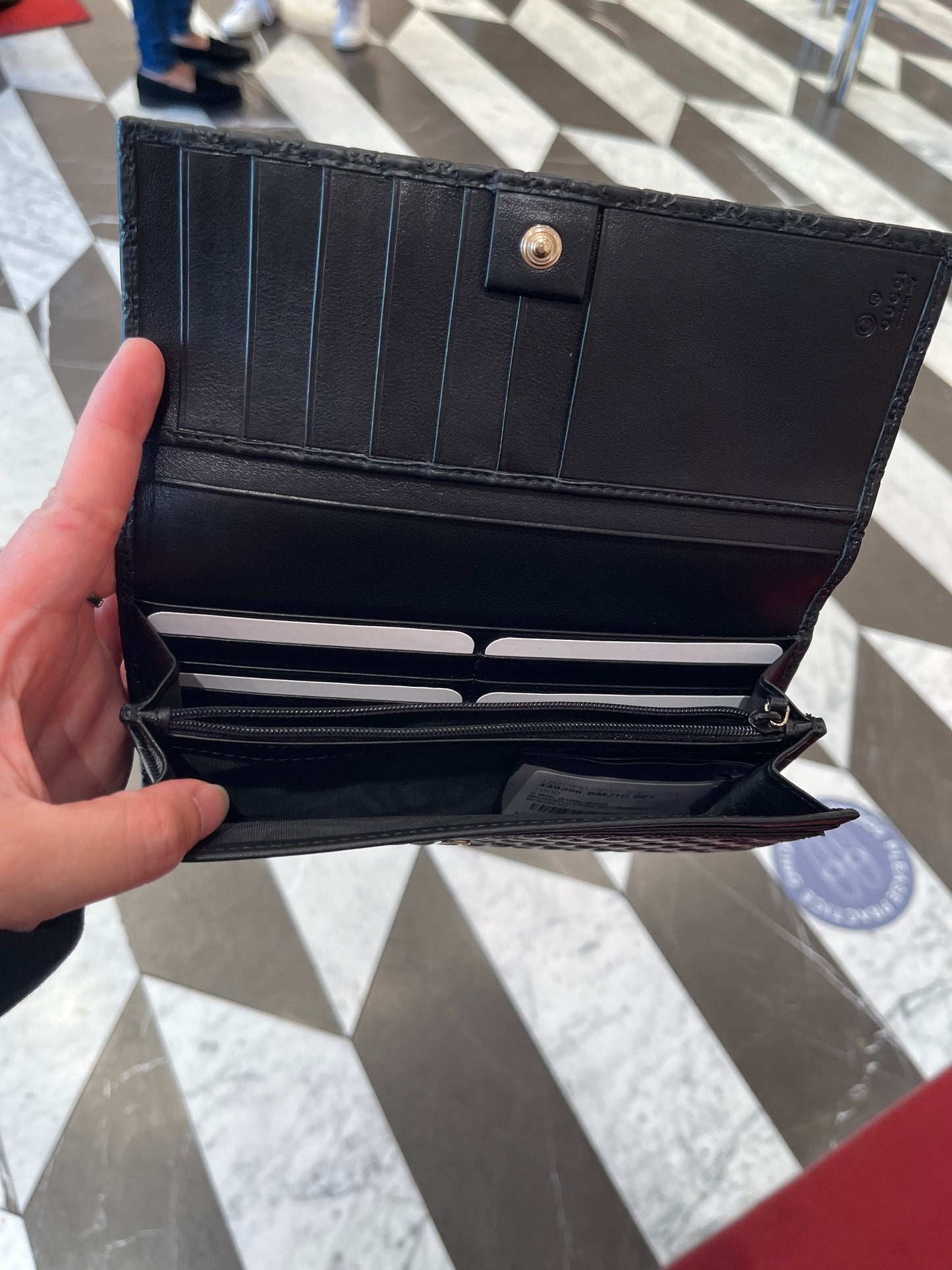 Gucci Monogram flap long wallet
