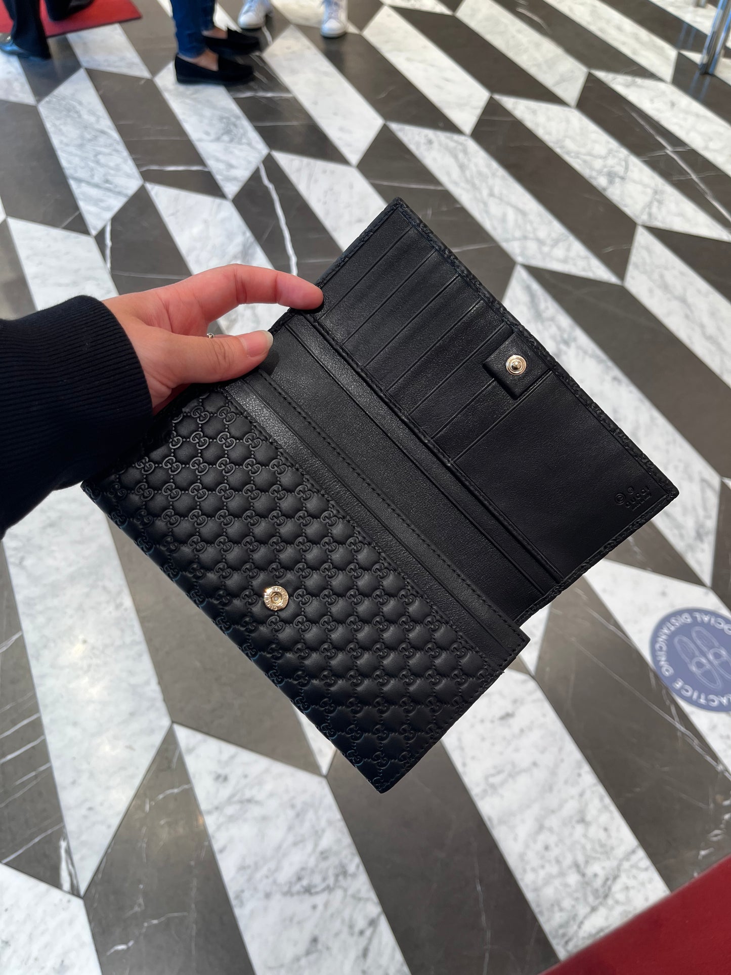 Gucci Monogram flap long wallet