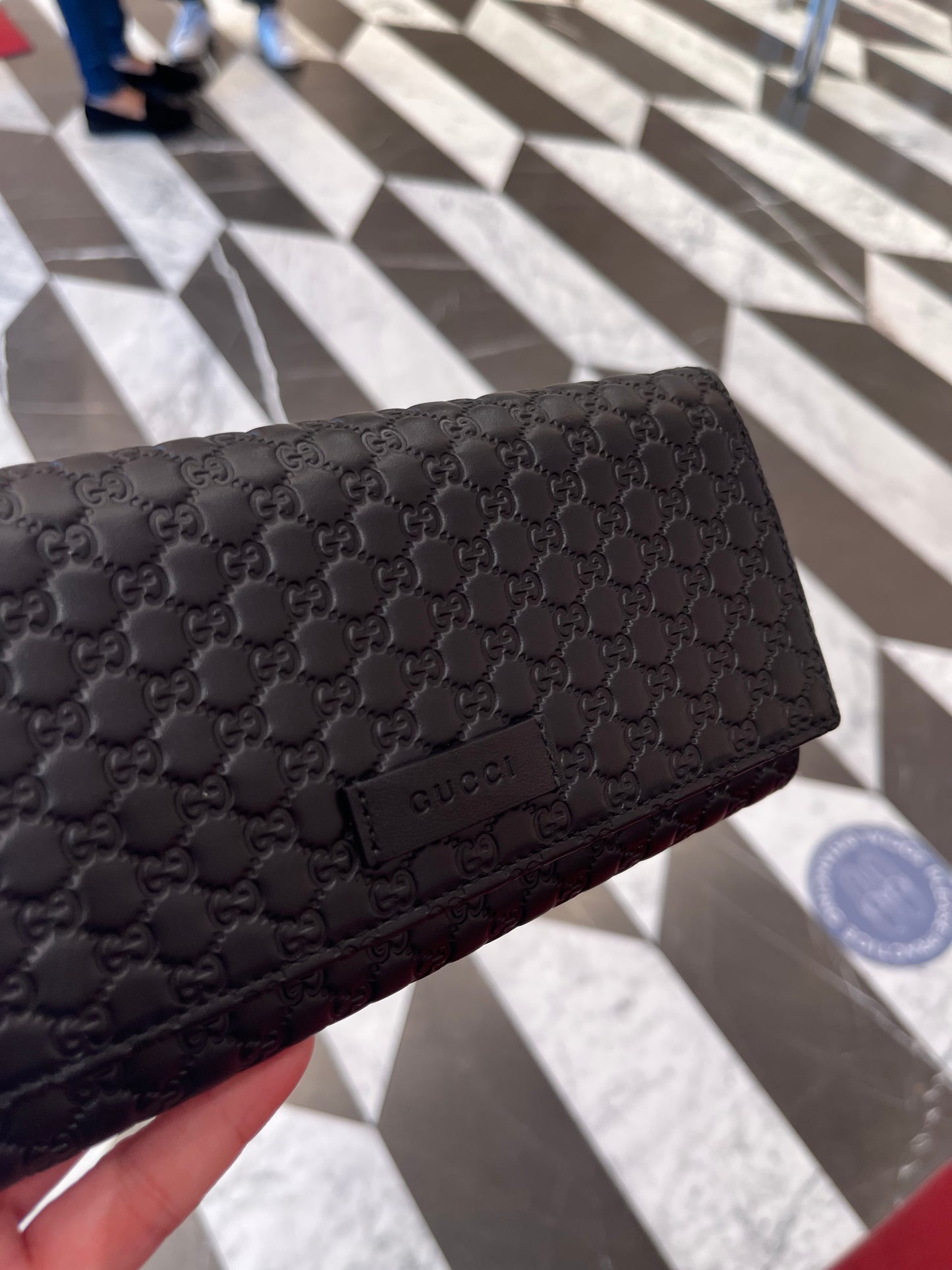 Gucci Monogram flap long wallet