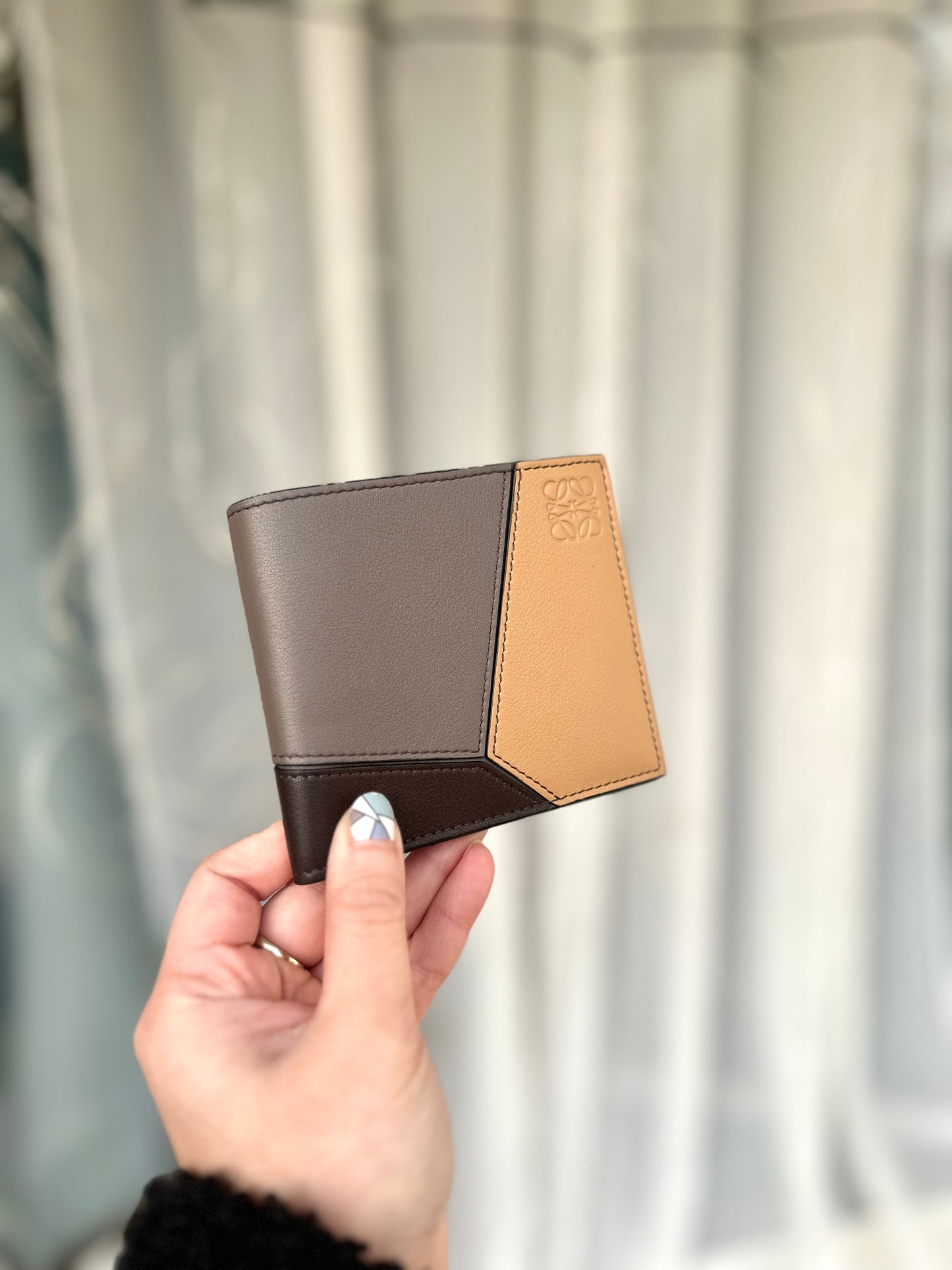 Puzzle bi-fold wallet