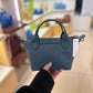 Longchamp mini Top handle cuir crossbody bag navy