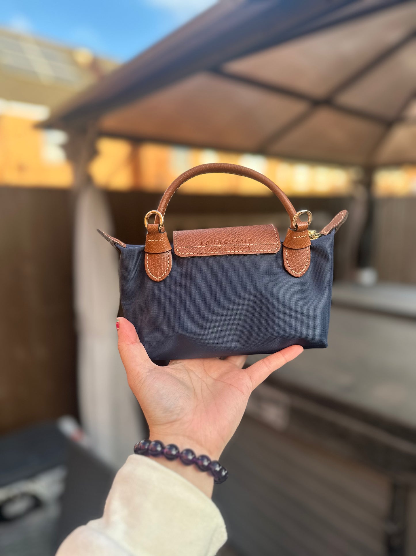 Longchamp mini pouch已改包長帶