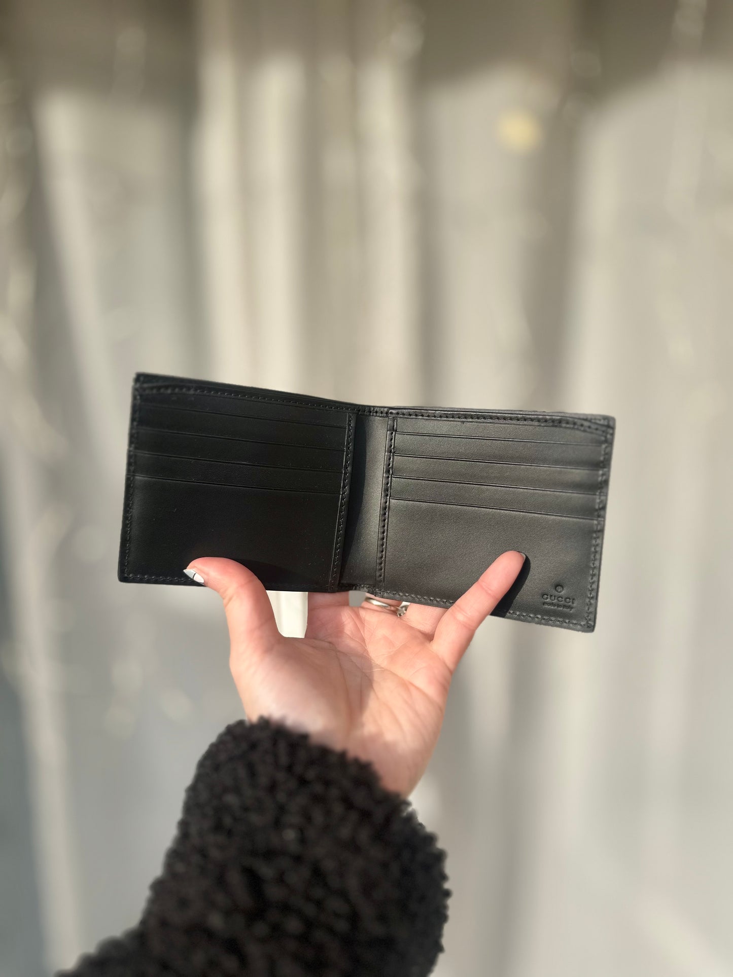 Monogram bi-fold wallet