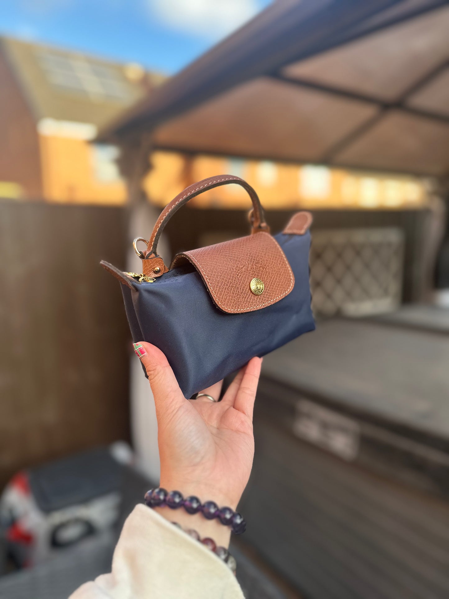 Longchamp mini pouch已改包長帶