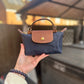 Longchamp mini pouch已改包長帶