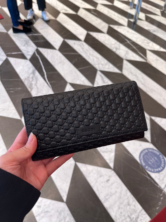 Gucci Monogram flap long wallet