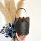 Small drawstring Triomphe bucket bag