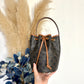 Small drawstring Triomphe bucket bag