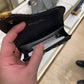 Saddle business card holder